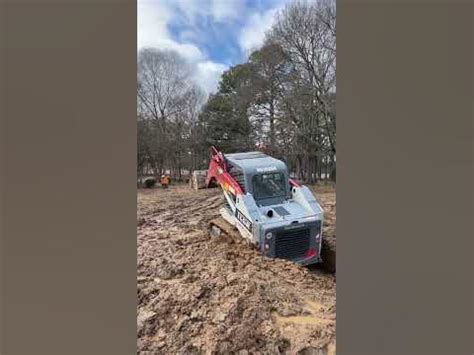 skid steer in mud|skid steer stuck in the mud.